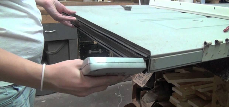 damaged steel door repair Madera Acres